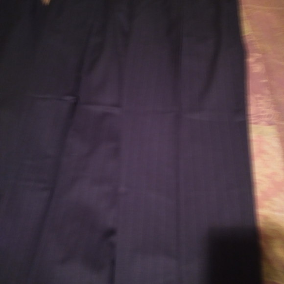 A Black Pinstripe 2 Button Suit. 50L 44/32. Pants are Pleated w Cuff - Picture 2 of 3